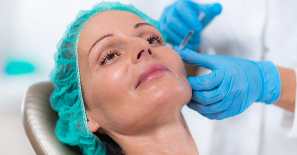 A woman receiving a PRP/PRF Therapy Skin Care Treatment