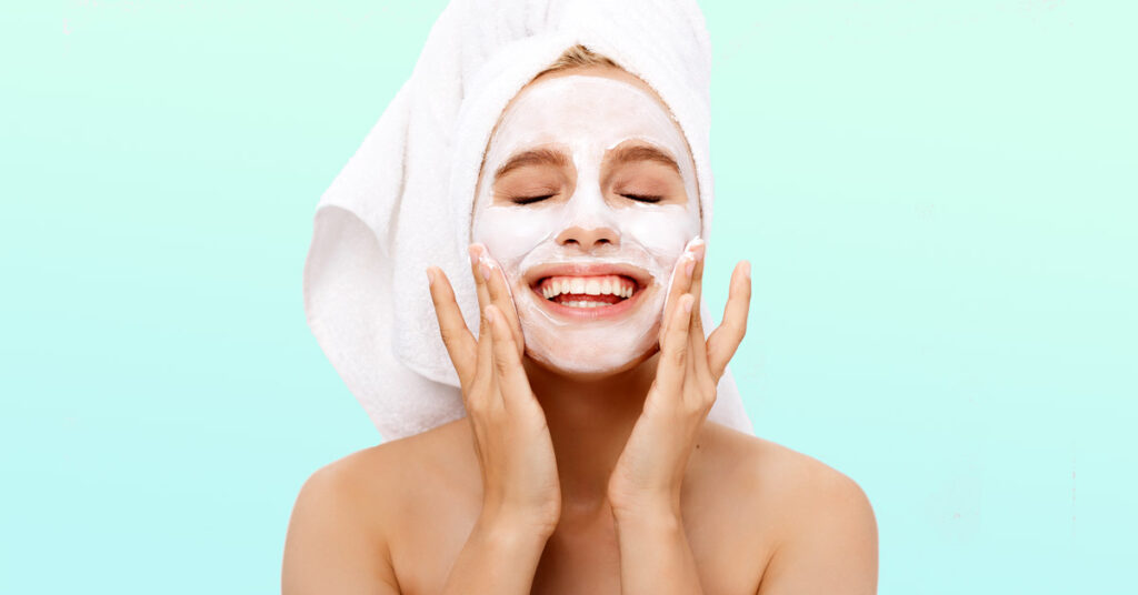 woman applying a facial